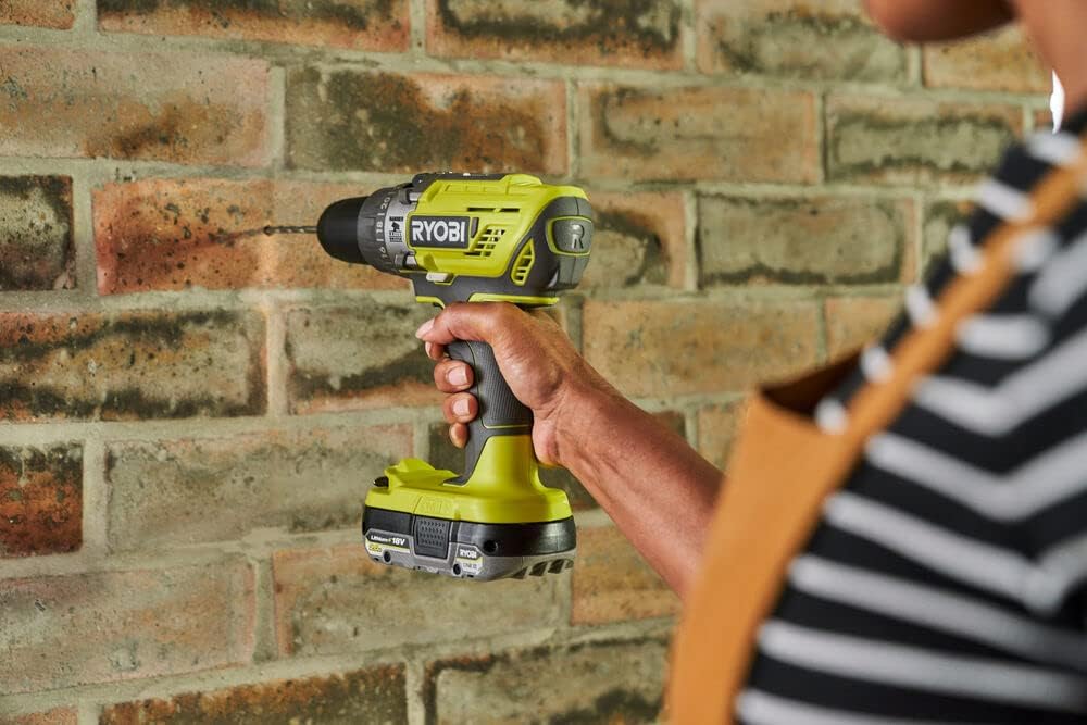 RYOBI Taladro Percutor Atornillador Inalámbrico 18V ONE+ con 2 Baterías 1.5Ah, Cargador y Bolsa - 2 Velocidades